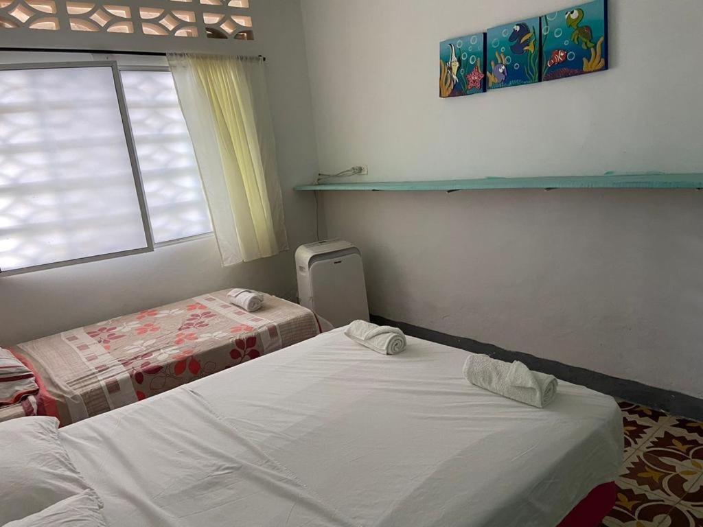 Costa De Vikingos Hotel โตลู ภายนอก รูปภาพ